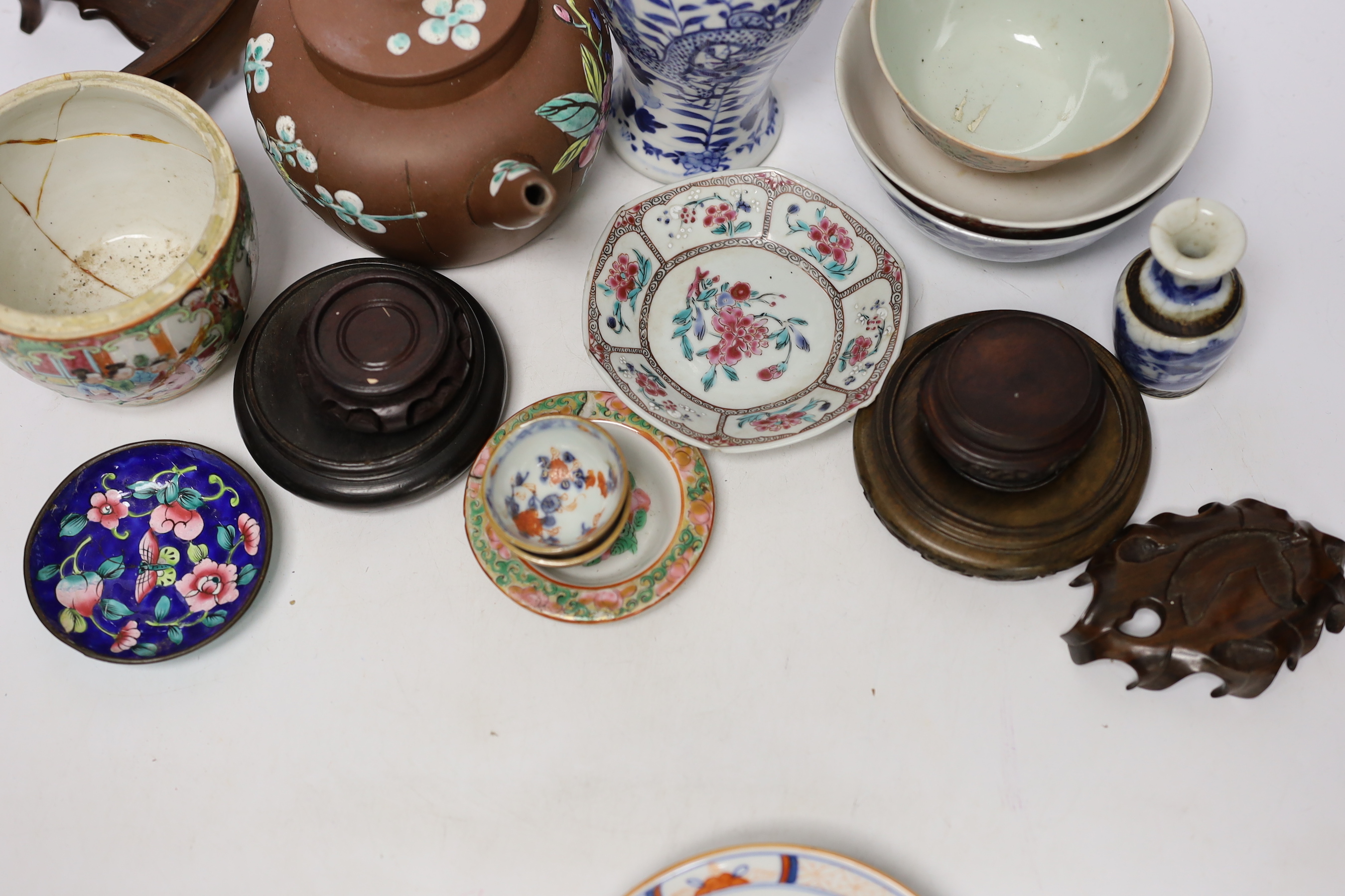 A collection of Chinese vases, pots and carved hardwood stands (18)
